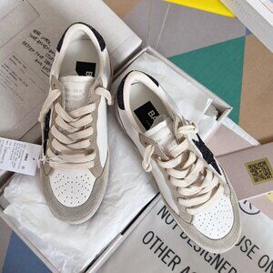 Golden Goose Women's light gray and black glitter star dirty shoes